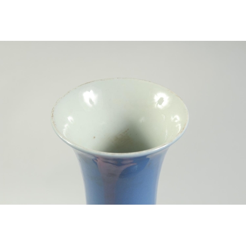 1201 - A CHINESE PORCELAIN BLUE BULBOUS VASE. 13ins high.