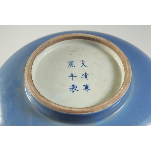 1201 - A CHINESE PORCELAIN BLUE BULBOUS VASE. 13ins high.