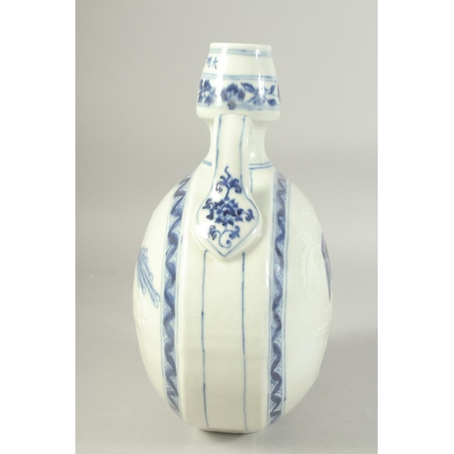 1212 - A CHINESE BLUE AND WHITE TWIN HANDLE MOON FLASK, decorated to each side with a bird. 29.5ins high.... 