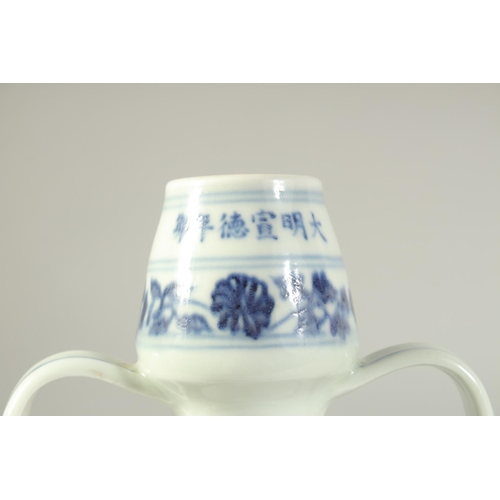 1212 - A CHINESE BLUE AND WHITE TWIN HANDLE MOON FLASK, decorated to each side with a bird. 29.5ins high.... 