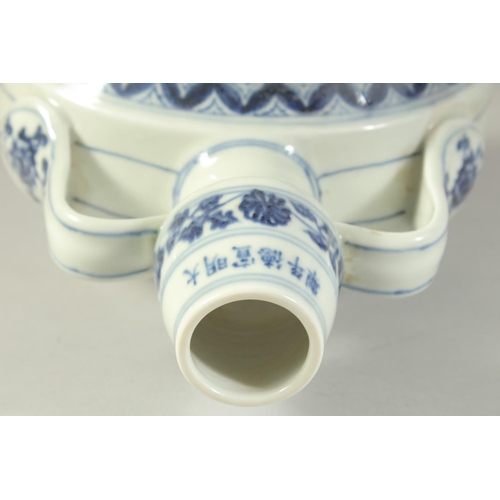 1212 - A CHINESE BLUE AND WHITE TWIN HANDLE MOON FLASK, decorated to each side with a bird. 29.5ins high.... 