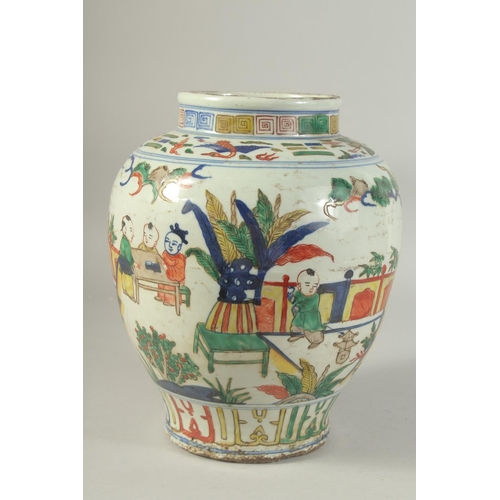 1214 - A CHINESE PORCELAIN WUCAI JAR painted with boys in a garden. 27ins high.