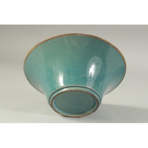 1220 - A CHINESE TURQUOISE GLAZE BOWL with incised characters. 22 cm diameter.