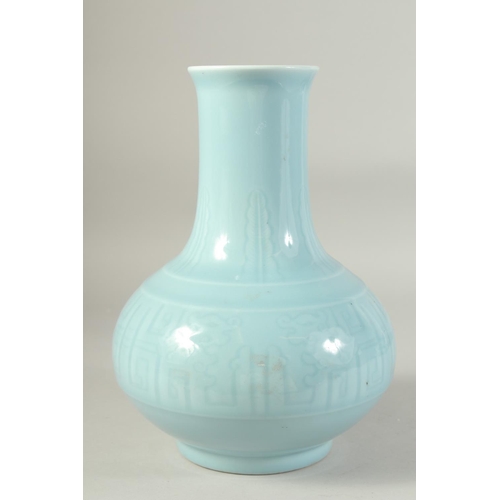 1221 - A CHINESE POWDER BLUE GLAZE PORCELAIN VASE. 28 cm high.