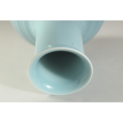 1221 - A CHINESE POWDER BLUE GLAZE PORCELAIN VASE. 28 cm high.