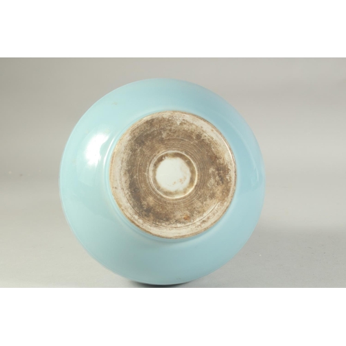 1221 - A CHINESE POWDER BLUE GLAZE PORCELAIN VASE. 28 cm high.