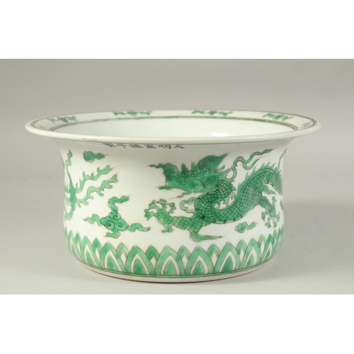 1222 - A CHINESE FAMILLE VERTE PORCELAIN BASIN decorated with dragons and stylised clouds. 27.5 cm diameter... 