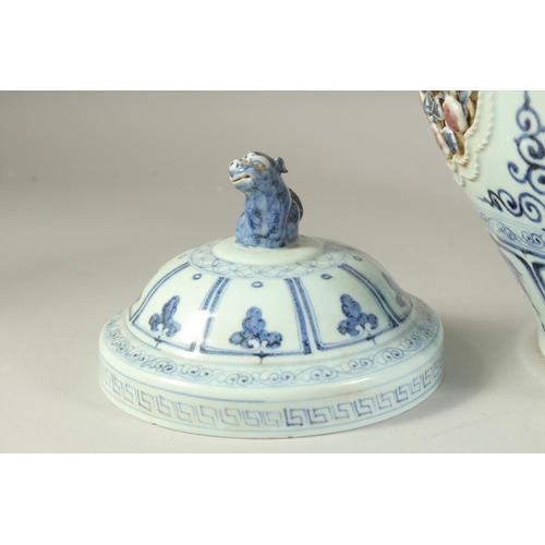 1225 - A LARGE CHINESE BLUE, WHITE AND UNDERGLAZE RED PORCELAIN JAR AND COVER, with relief panels depicting... 