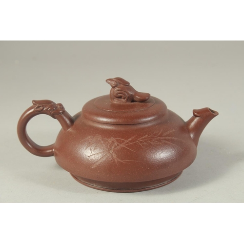 1229 - A CHINESE YIXING TEA POT. 17.5 cm (spout to handle).