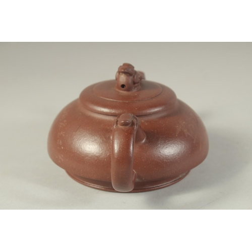 1229 - A CHINESE YIXING TEA POT. 17.5 cm (spout to handle).