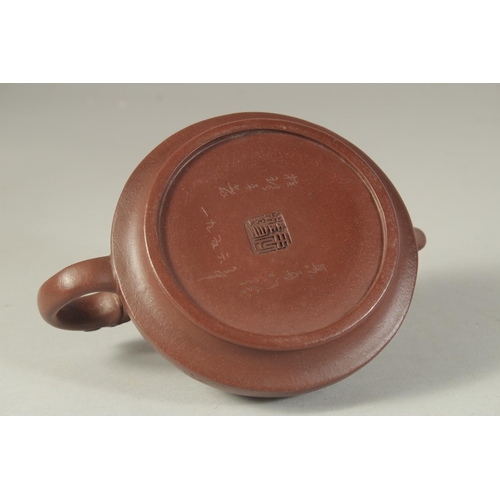 1229 - A CHINESE YIXING TEA POT. 17.5 cm (spout to handle).