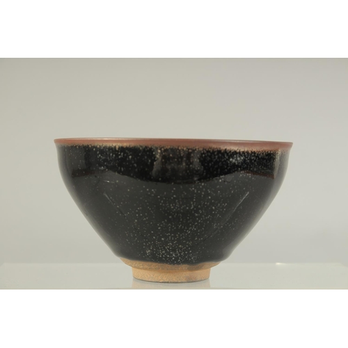 1231 - A CHINESE STUDIO POTTERY BOWL. 12cm diameter.