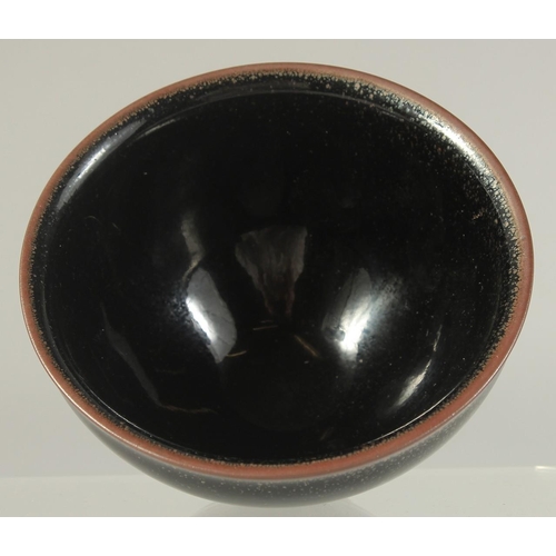 1231 - A CHINESE STUDIO POTTERY BOWL. 12cm diameter.