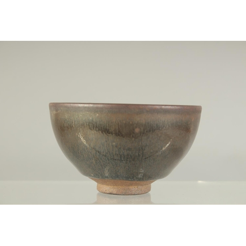 1232 - A CHINESE STUDIO POTTERY BOWL. 9cm diameter.