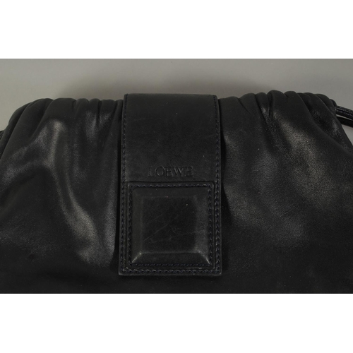 1315 - A LOEWE OF MADRID 1946 SOFT LEATHER BLACK BAG, 9.5ins long.