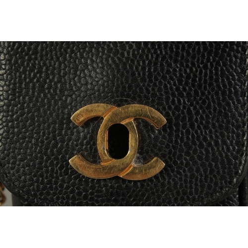 1323 - A CHANEL BLACK LEATHER SPECTACLE CASE, 6.5ins x 3ins with a long entwined gilt metal and leather str... 