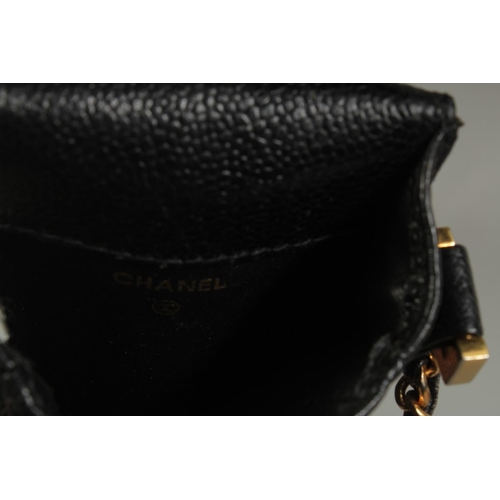 1323 - A CHANEL BLACK LEATHER SPECTACLE CASE, 6.5ins x 3ins with a long entwined gilt metal and leather str... 