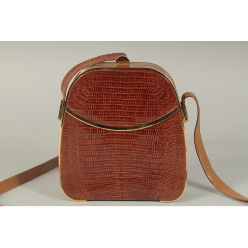 1332 - A SMALL MADLER, WEST GERMANY, SNAKESKIN BAG. 5.5ins x 6ins with long straps.