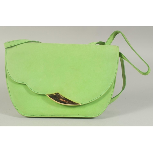 1334 - AN ESCADA, ITALY, GREEN SUEDE BAG, 9.5ins long with long strap.