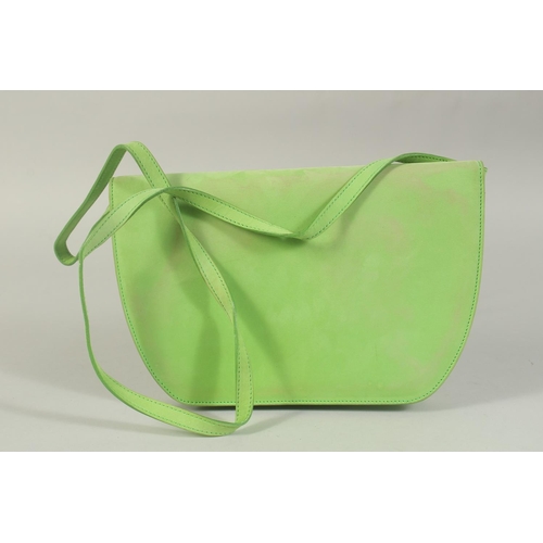 1334 - AN ESCADA, ITALY, GREEN SUEDE BAG, 9.5ins long with long strap.