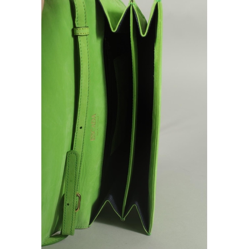 1334 - AN ESCADA, ITALY, GREEN SUEDE BAG, 9.5ins long with long strap.