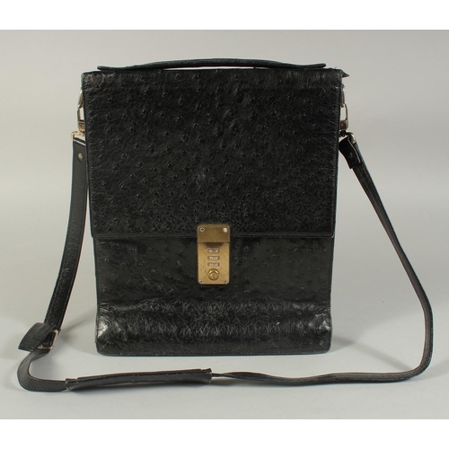 1336 - A MADDLER ZURICH BLACK CROCODILE SKIN BAG (USED) 9ins long, 11ins high.