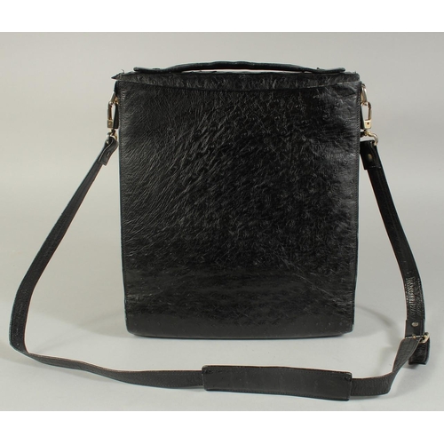 1336 - A MADDLER ZURICH BLACK CROCODILE SKIN BAG (USED) 9ins long, 11ins high.