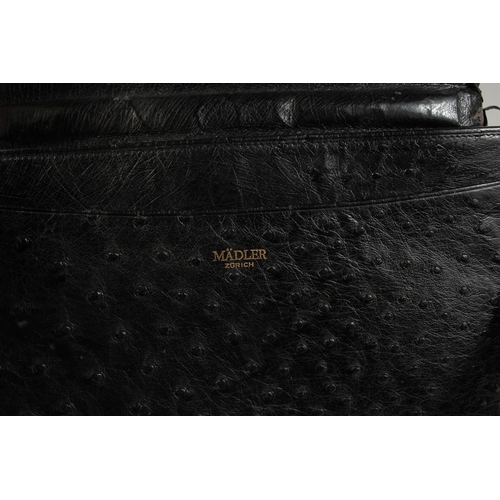 1336 - A MADDLER ZURICH BLACK CROCODILE SKIN BAG (USED) 9ins long, 11ins high.