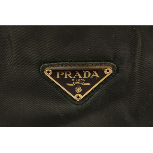 1337 - A PRADA MILANO SOFT BLACK BAG, 12ins, 10ins high with entwined gilt metal and leather strap.