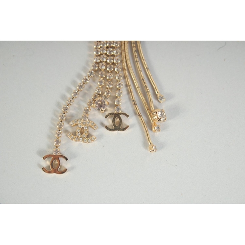 1355 - A GOOD CHANEL GILT SPRAY BROOCH set with diamante with gilt hanging drops in a Chanel box.