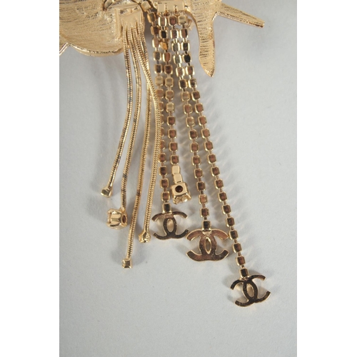 1355 - A GOOD CHANEL GILT SPRAY BROOCH set with diamante with gilt hanging drops in a Chanel box.