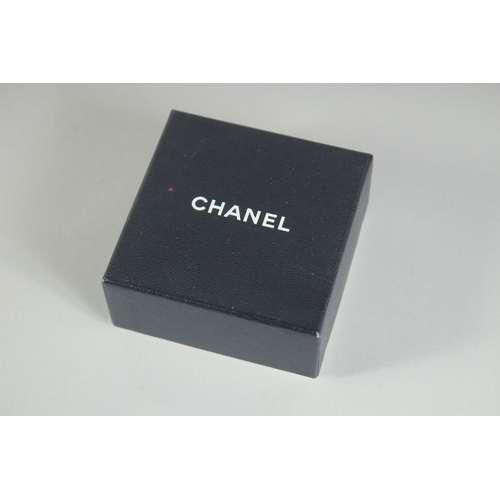 1356 - A LARGE CHANEL SIX PETAL FLOWER BROOCH with diamante. Signed, 5.5cm diameter in a Chanel box.