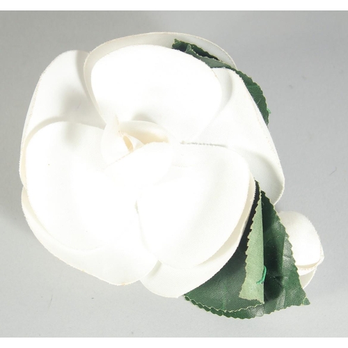 1357 - A CHANEL SILK WHITE FLOWER BROOCH. Signed.