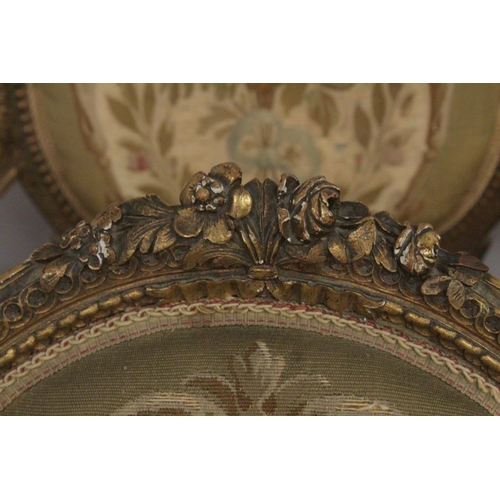 1016 - A GOOD SET OF FOUR LOUIS XVI 19TH CENTURY GILT ARMCHAIRS with oval backs and open arms, padded seats... 