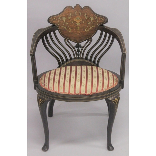 1020 - A VICTORIAN ROSEWOOD INLAID TUB ARMCHAIR with padded seats on curving legs.