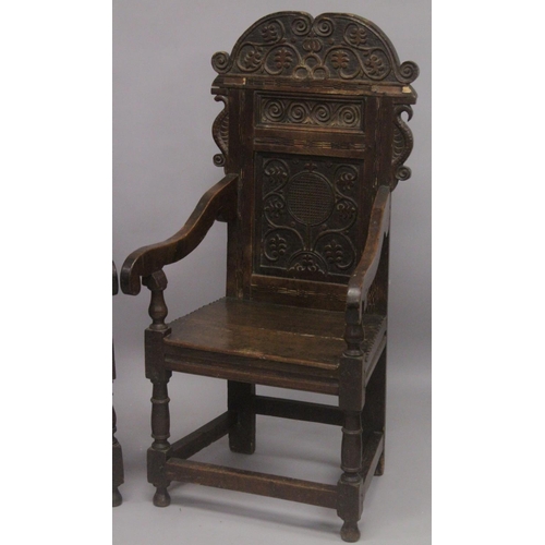 1024 - A GOOD PAIR OF MOSTLY 17TH - EARLY 18TH CENTURY OAK WAINSCOT CHAIRS with carved backs, bog oak inlay... 