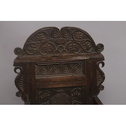 1024 - A GOOD PAIR OF MOSTLY 17TH - EARLY 18TH CENTURY OAK WAINSCOT CHAIRS with carved backs, bog oak inlay... 