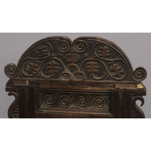 1024 - A GOOD PAIR OF MOSTLY 17TH - EARLY 18TH CENTURY OAK WAINSCOT CHAIRS with carved backs, bog oak inlay... 