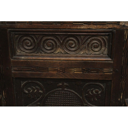 1024 - A GOOD PAIR OF MOSTLY 17TH - EARLY 18TH CENTURY OAK WAINSCOT CHAIRS with carved backs, bog oak inlay... 