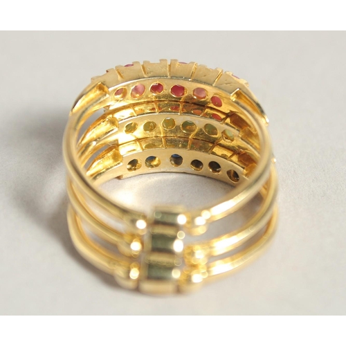 1807 - A SILVER AND 18 CT GOLD PLATED SAPPHIRE RUBY AND EMERALD STACK RING.