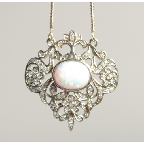 1809 - A SILVER AND OPAL PENDANT AND CHAIN.