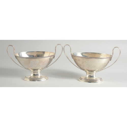 1952 - A GOOD PAIR OF GEORGE III SILVER OVAL TWO HANDLED SAUCE TUREENS with bead edge. London 1784. Maker: ... 