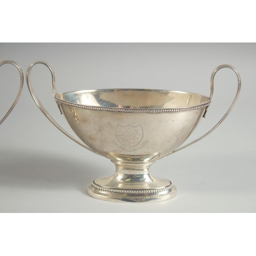 1952 - A GOOD PAIR OF GEORGE III SILVER OVAL TWO HANDLED SAUCE TUREENS with bead edge. London 1784. Maker: ... 