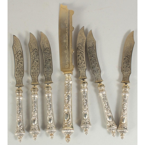 1956 - A BOXED SET OF SEVEN AUSTRO-HUNGARIAN SILVER-PLATED HANDLE KNIVES.