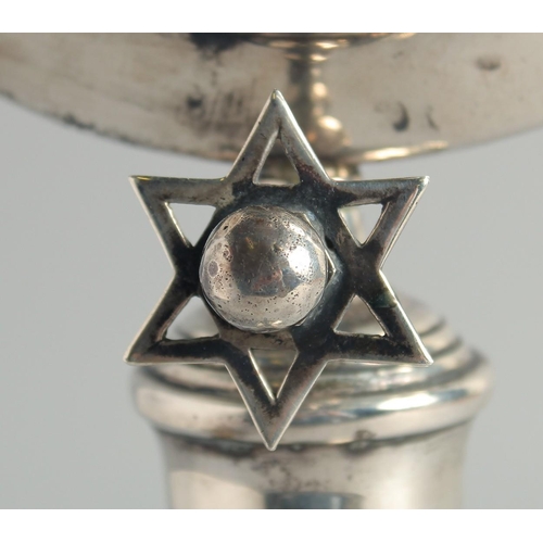 1957 - A GOOD JEWISH SILVER MENORAH on a circular base. 12ins high.