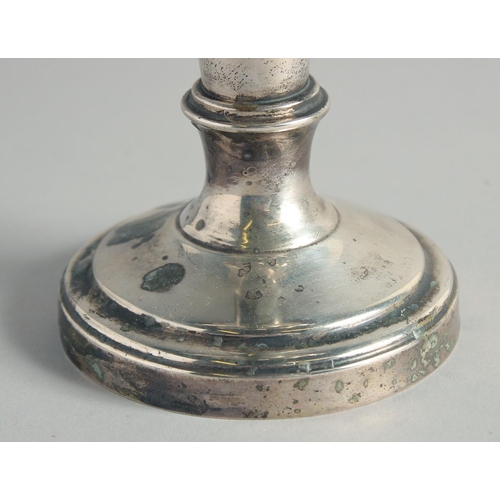 1957 - A GOOD JEWISH SILVER MENORAH on a circular base. 12ins high.