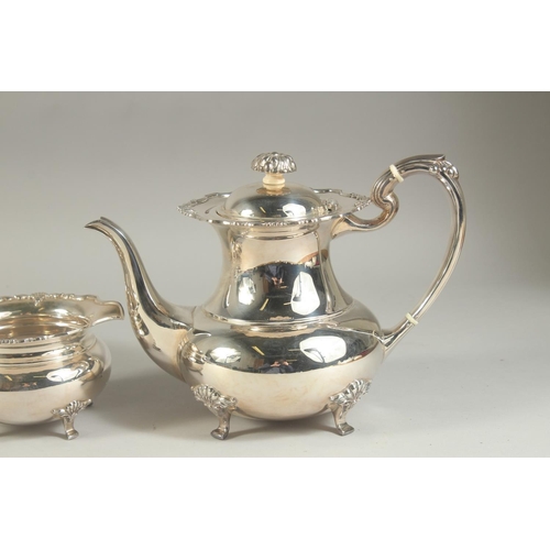 1958 - A VERY GOOD FOUR PIECE SILVER CIRCULAR TEA SET of pie crust design with shell mounts, comprising: te... 