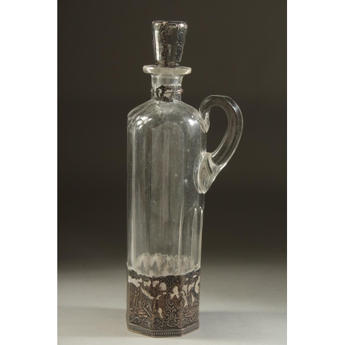 1960 - A DUTCH GLASS LIQUEUR DECANTER AND STOPPER with carrying handle and silver top and base. 11.5ins hig... 