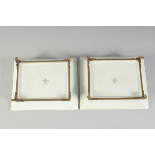 1129 - A PAIR OF SEVRES STYLE PINK RECTANGULAR TRAYS.