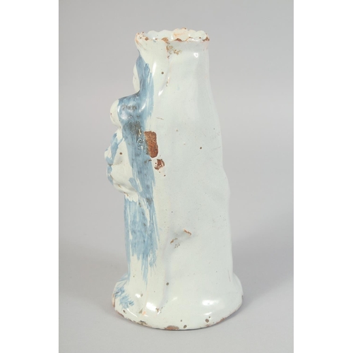 1136 - A GOOD 18TH CENTURY FRENCH BLUE AND WHITE MADONNA AND CHILD VASE. 8.5ins high.